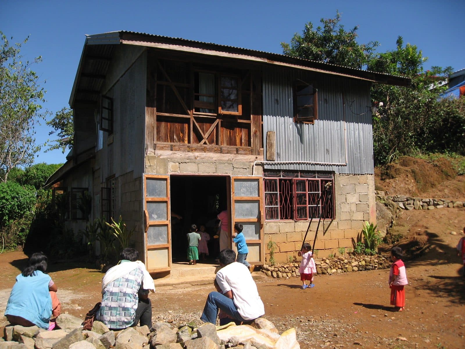 Members gathered outside Lutang Assembly of God church in Benguet